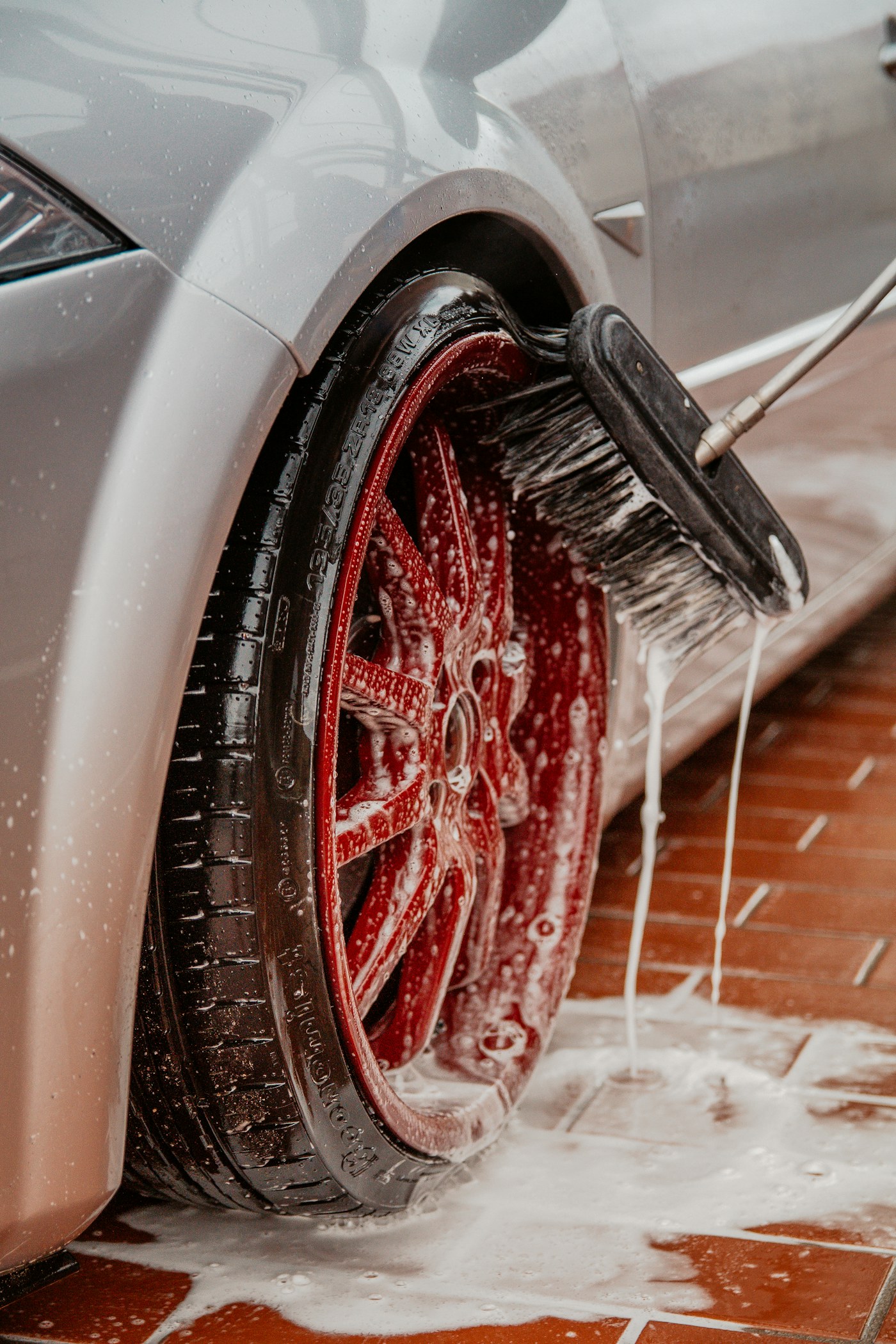 Foam pre-rinse on a dark car